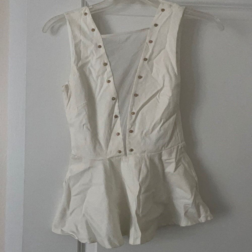 Peplum going out top with mesh front